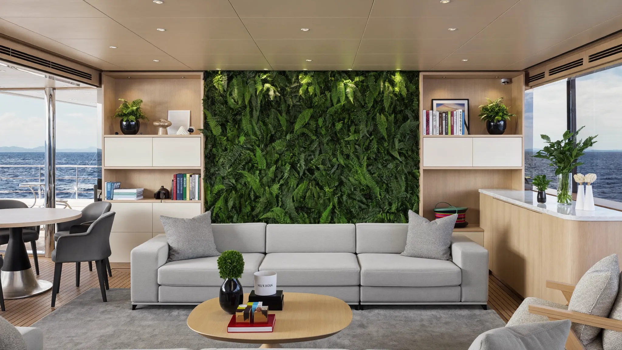 A living wall of ferns and moss in a superyacht main saloon